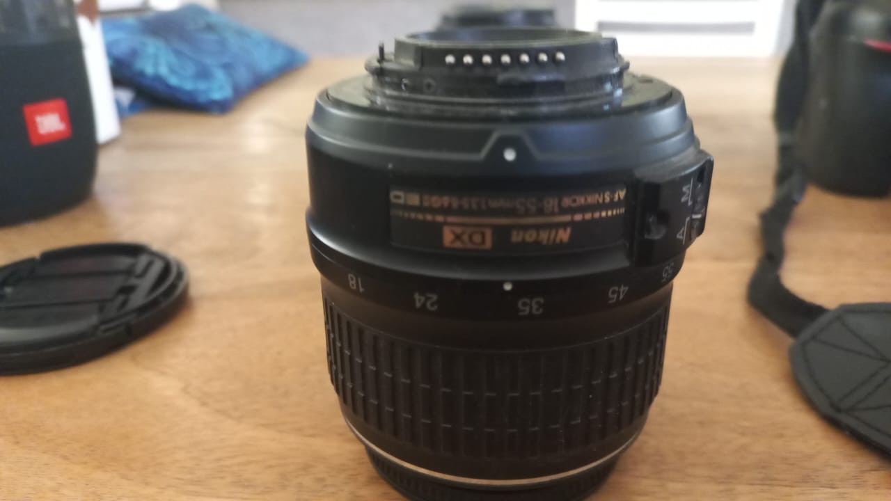 Nikon camera with lenses and battery pack