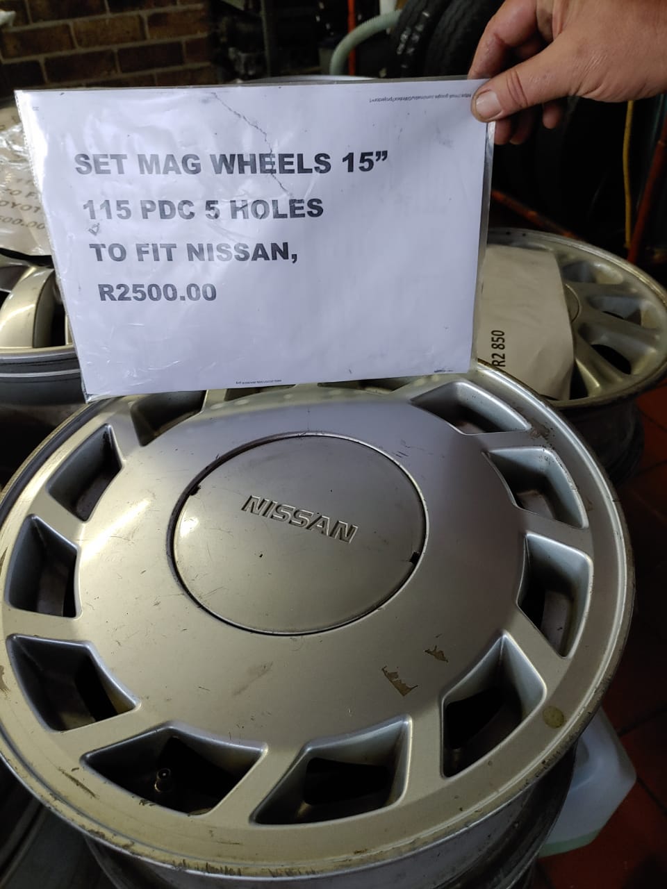NISSIAN SET OF MAGS 15" 5 HOLE 115 PCD FOR SALE