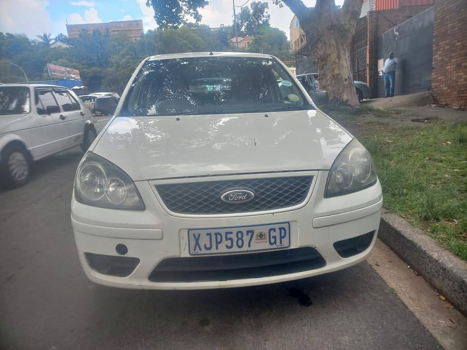 Ford Ikon Sedan 2009 Model 1.4 Engine Petrol, Manual Transmission, White Color, Mileage