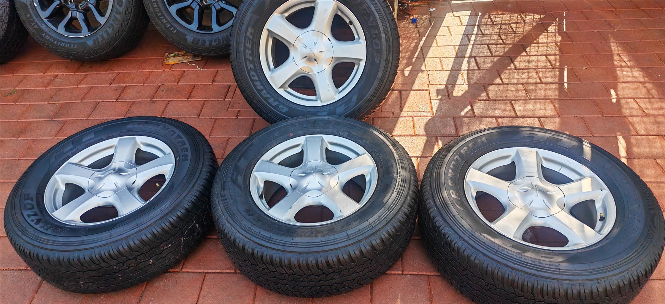 Isuzu wheels with dunlop grandtrek AT25 - Private Seller Isuzu wheels with dunlop grandtrek AT25 - Private Seller