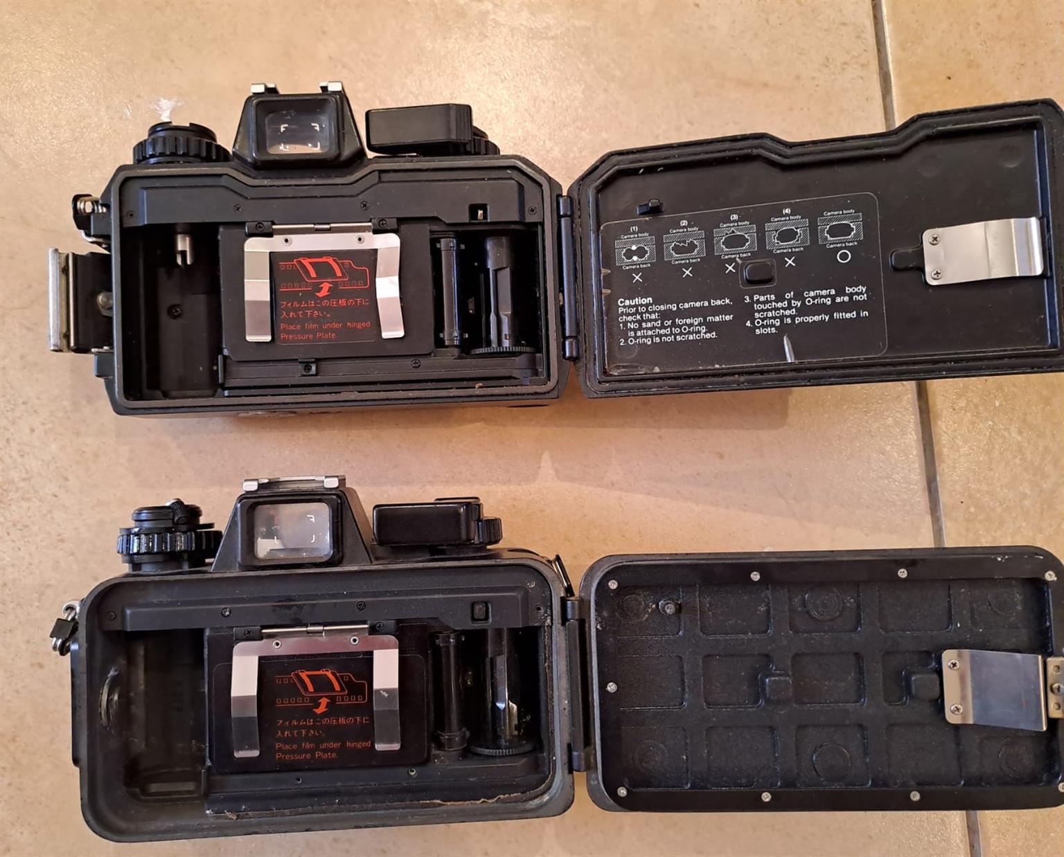 NIKONOS CAMERA AND ACCESORIES