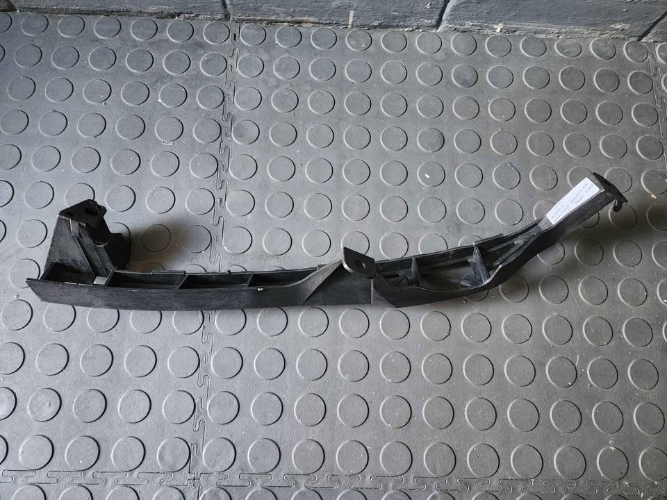 MAZDA 3 HEADLIGHT BRACKET - RHS