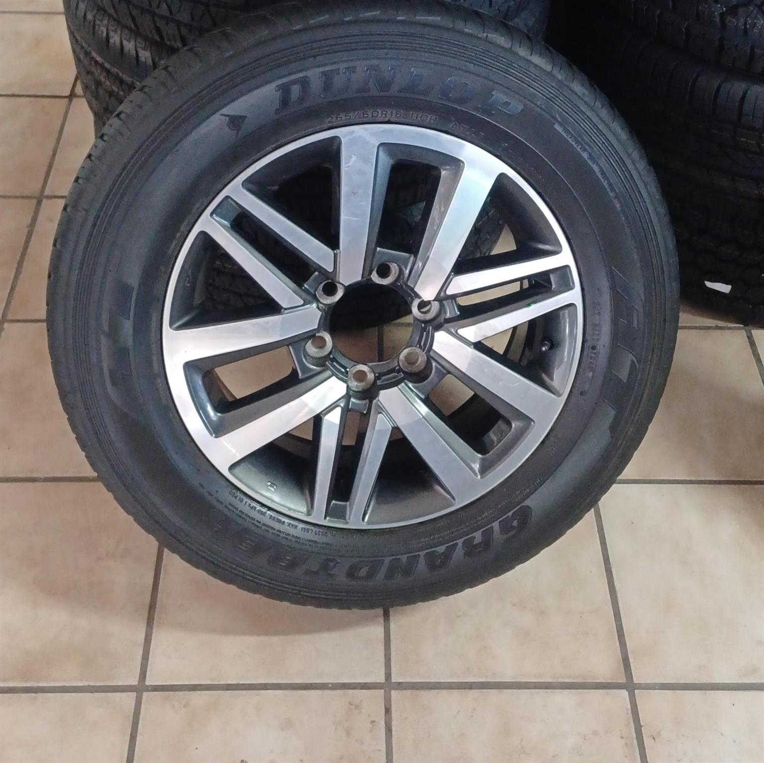 Toyota Hilux/Fortuner 18inch original mag with used 265/60/18 Dunlop Grandtrek A - Private Seller Toyota Hilux/Fortuner 18inch original mag with used 265/60/18 Dunlop Grandtrek A - Private Seller
