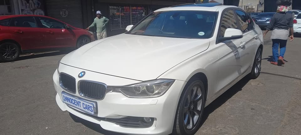 2013 BMW 320i AUTOMATIC TRANSMISSION.. WHITE COLOUR.. 92000KM.. USED