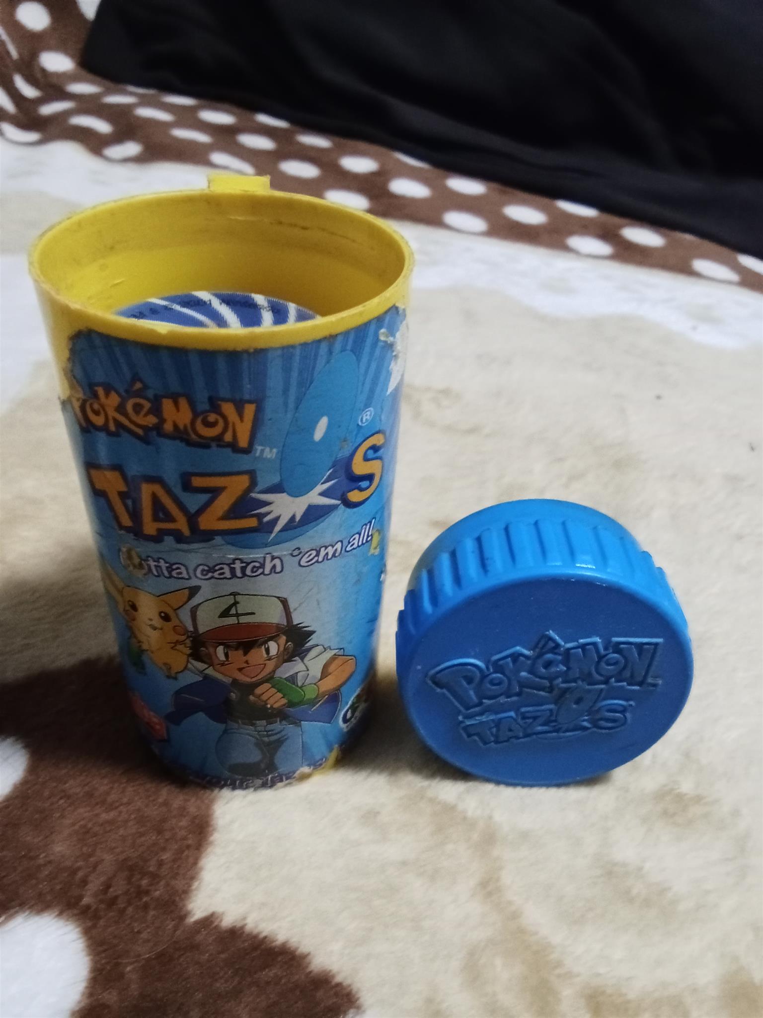 83× Pokemon Tazos with holder 83× Pokemon Tazos with holder