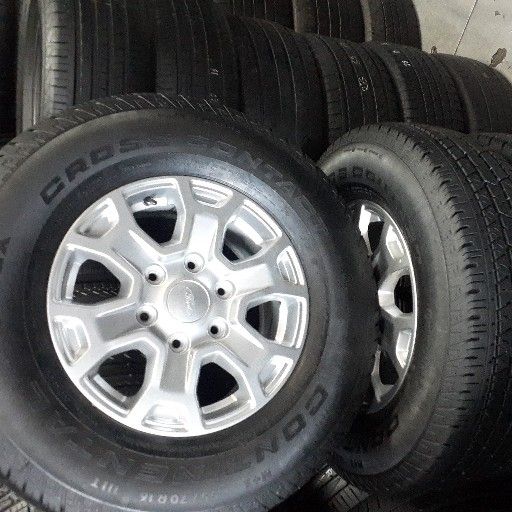 90% new fairly used Ford rims and tyre