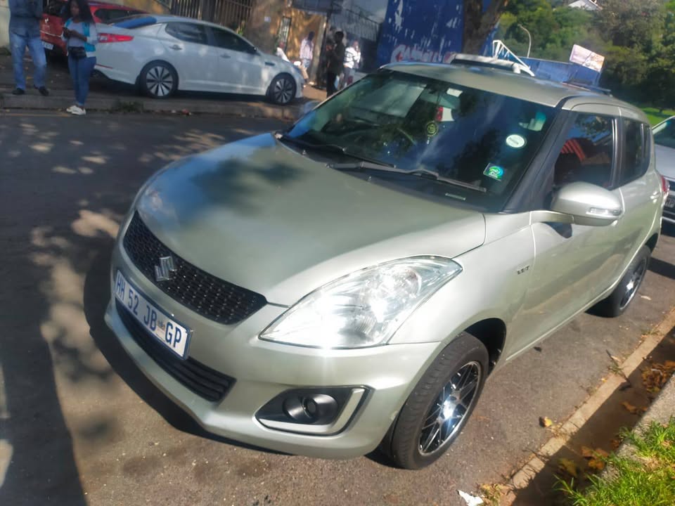 2017 Suzuki Swift Hatchback 1.2 Petrol, Manual Transmission, Gold Color, Mileage 87000kms