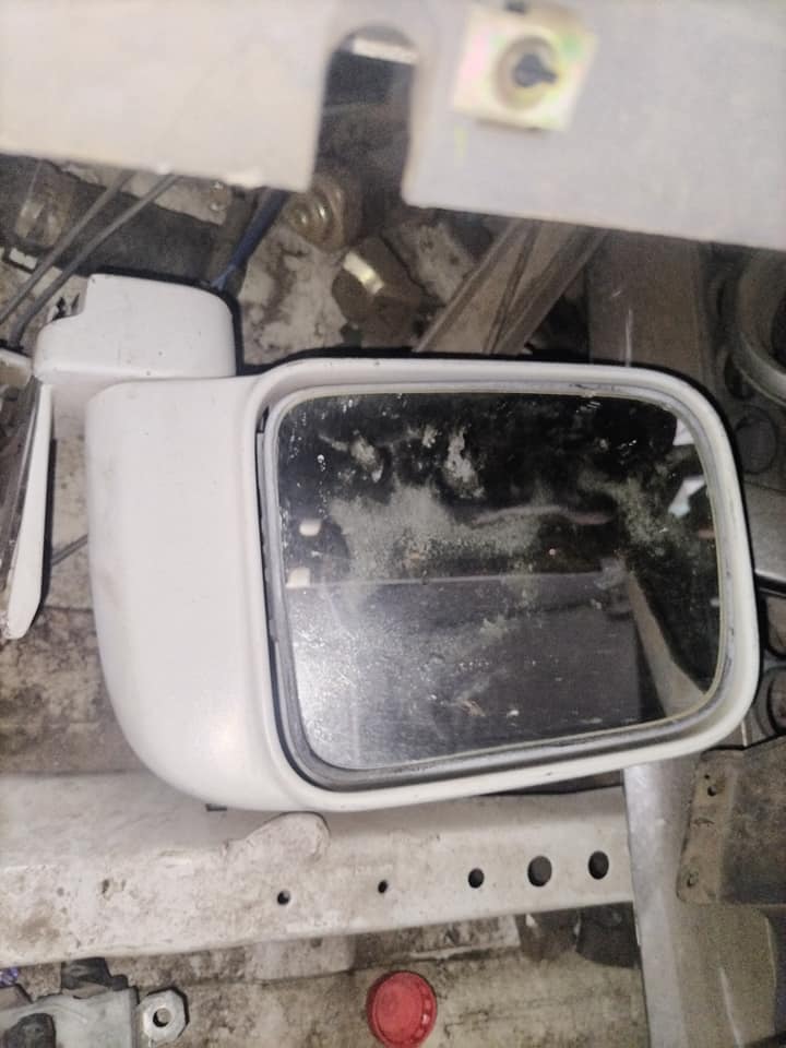 Nissan hardbody side view mirror Call or WhatsApp me - Private Seller