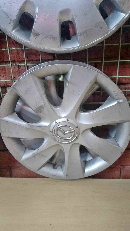 Mazda wheel caps - Private Seller Mazda wheel caps - Private Seller