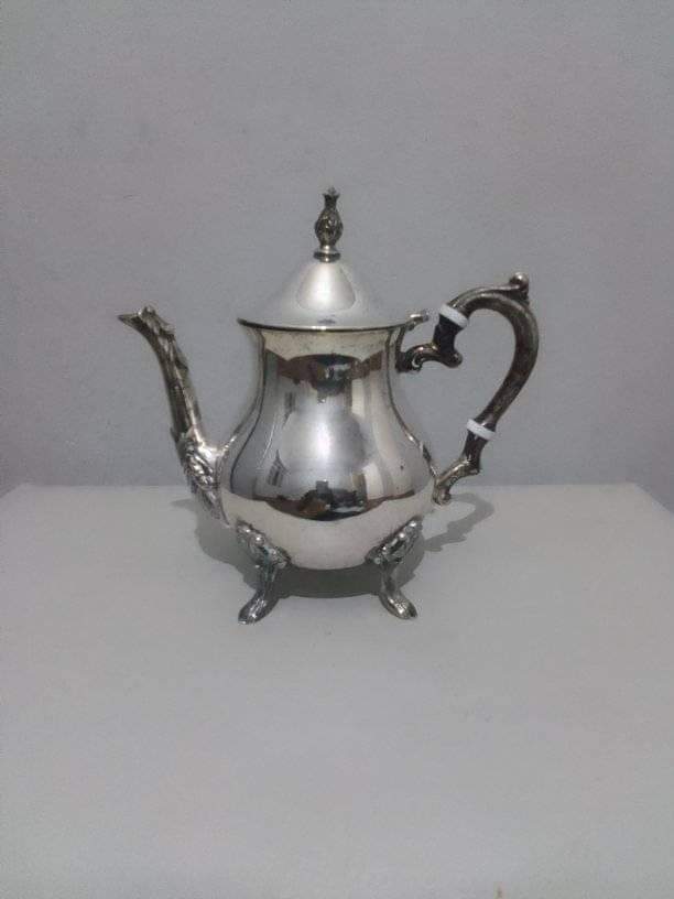 A silver plated vintage teapot