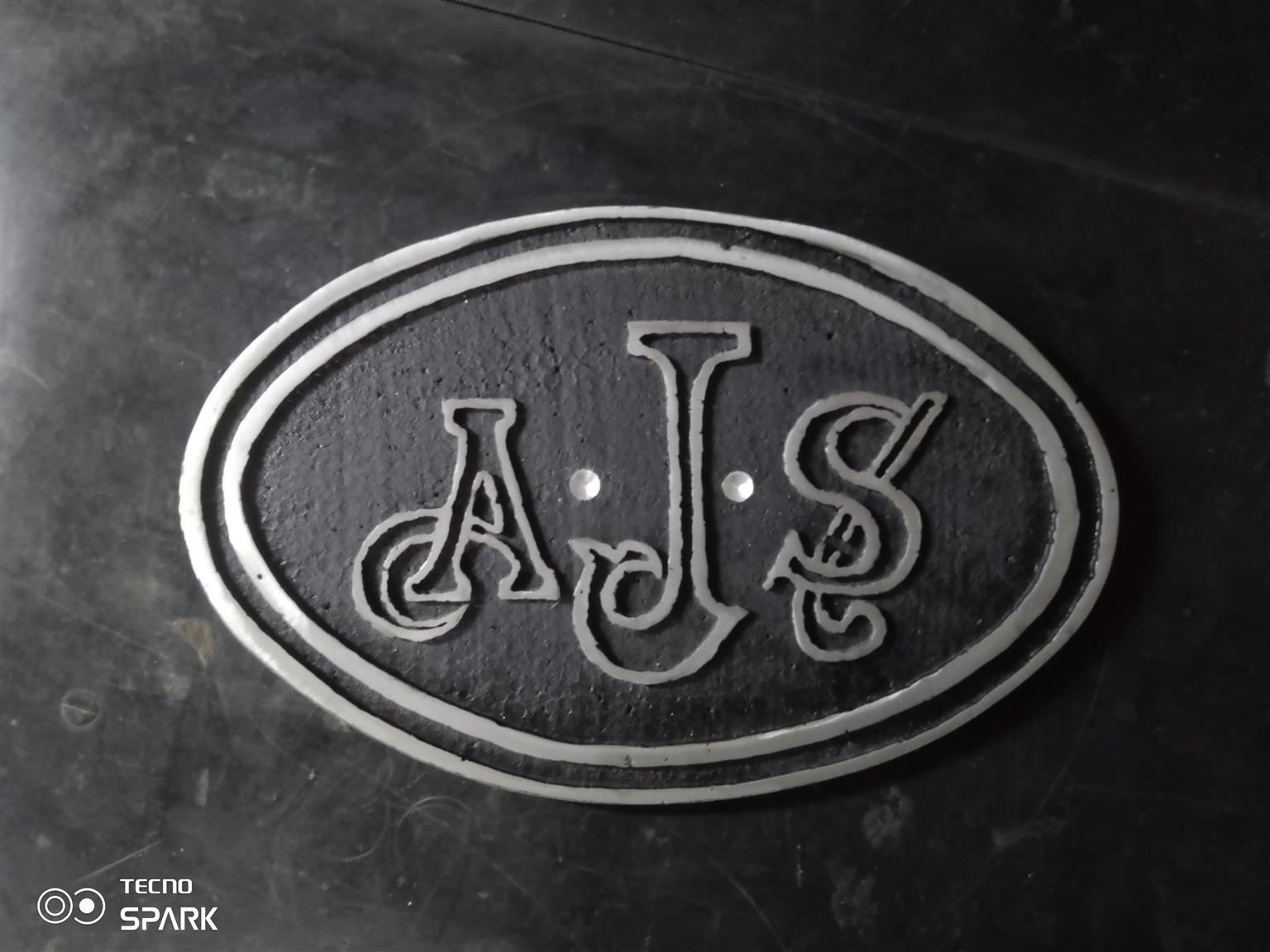 Vintage A•J•S aluminum plaque Vintage A•J•S aluminum plaque