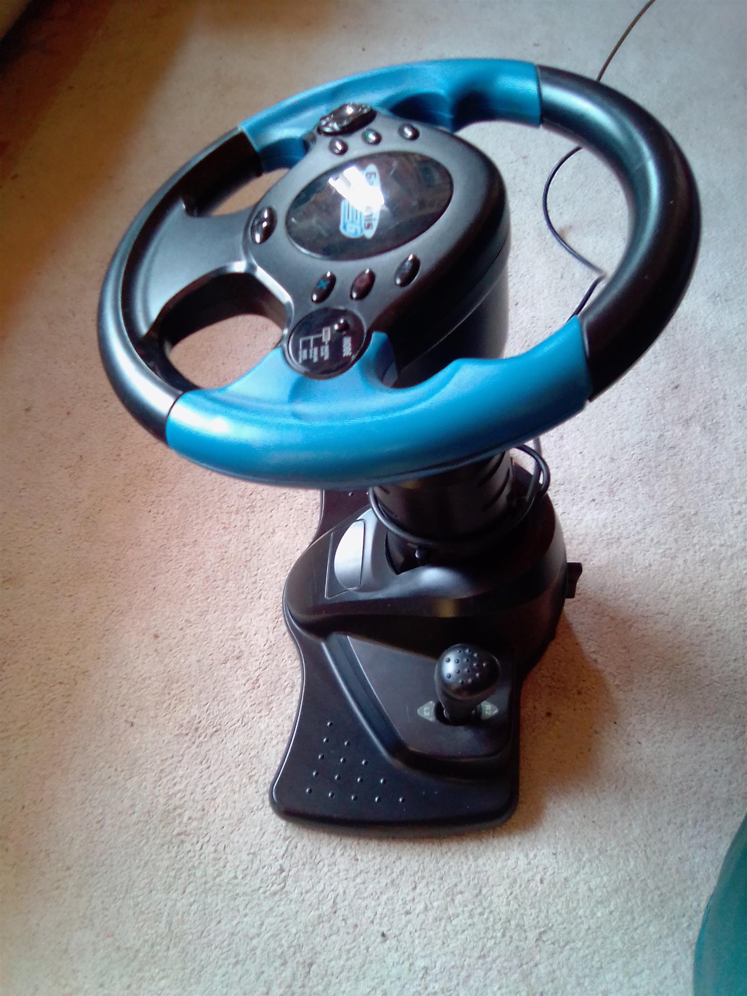 Steering Wheel & Gear Lever for PS2. Adjustable height and angle. No pedals. 