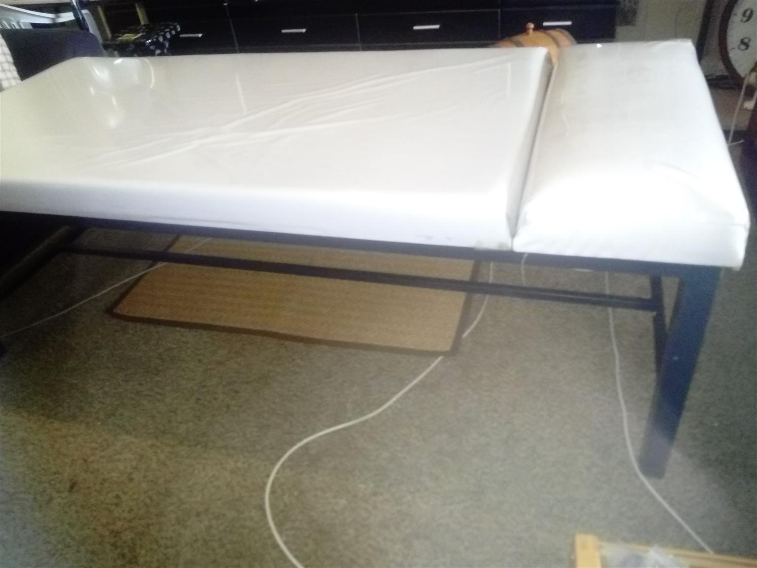 Massage bed with thick matress R 1800.