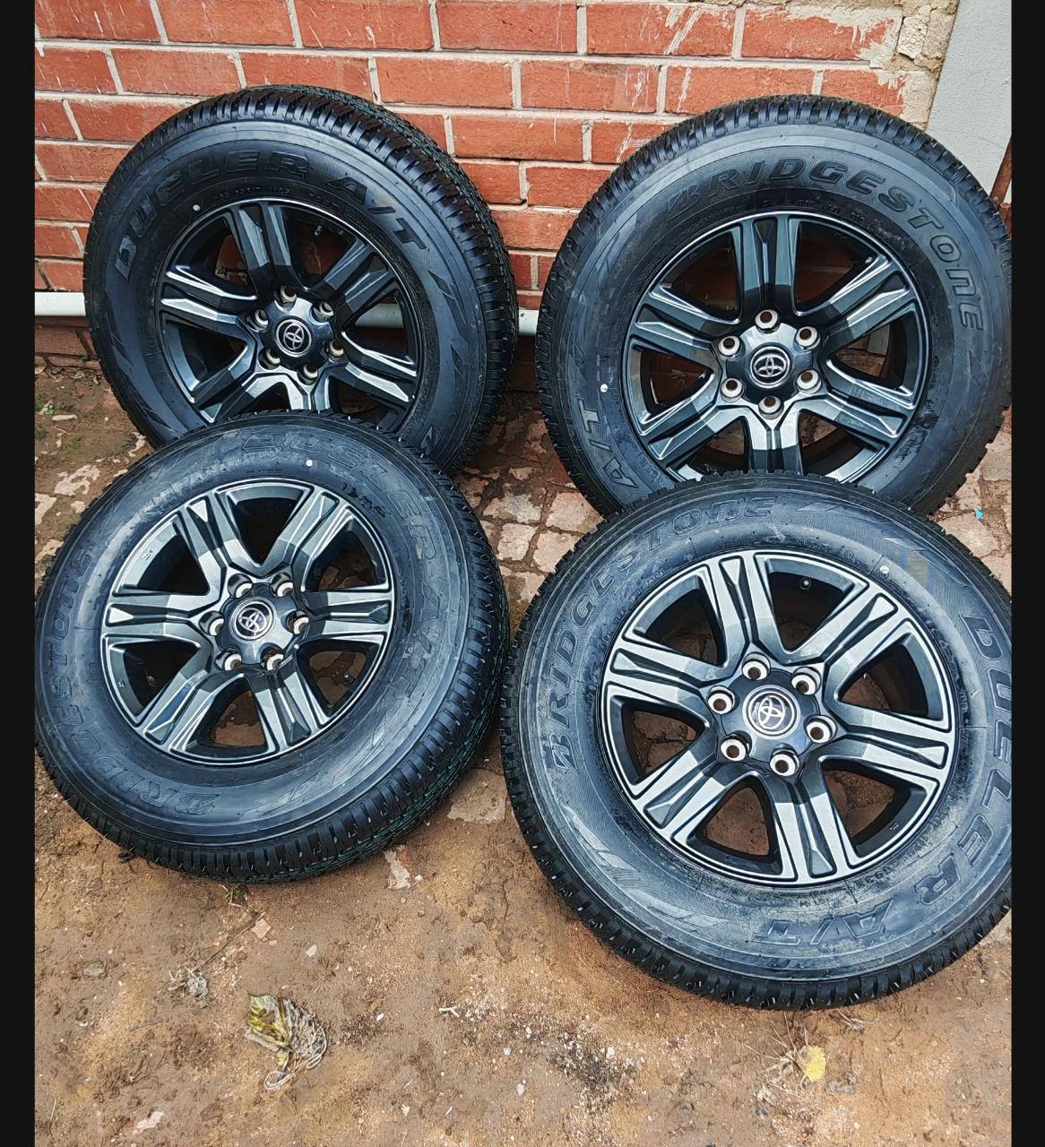 17inch Toyota Hilux/Fortuner OEM mags with brand new 265/65/17 Bridgestone Duell - Private Seller 17inch Toyota Hilux/Fortuner OEM mags with brand new 265/65/17 Bridgestone Duell - Private Seller