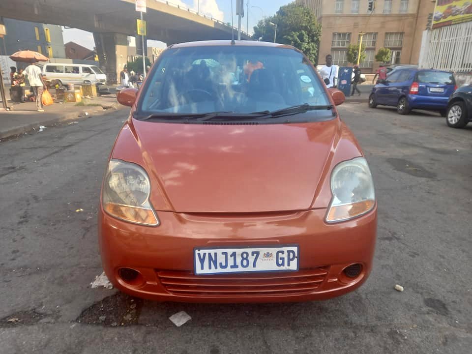 2009 CHEVROLET SPARK 1.1 PETROL, MANUAL TRANSMISSION, ORANGE COLOUR, MILEAGE