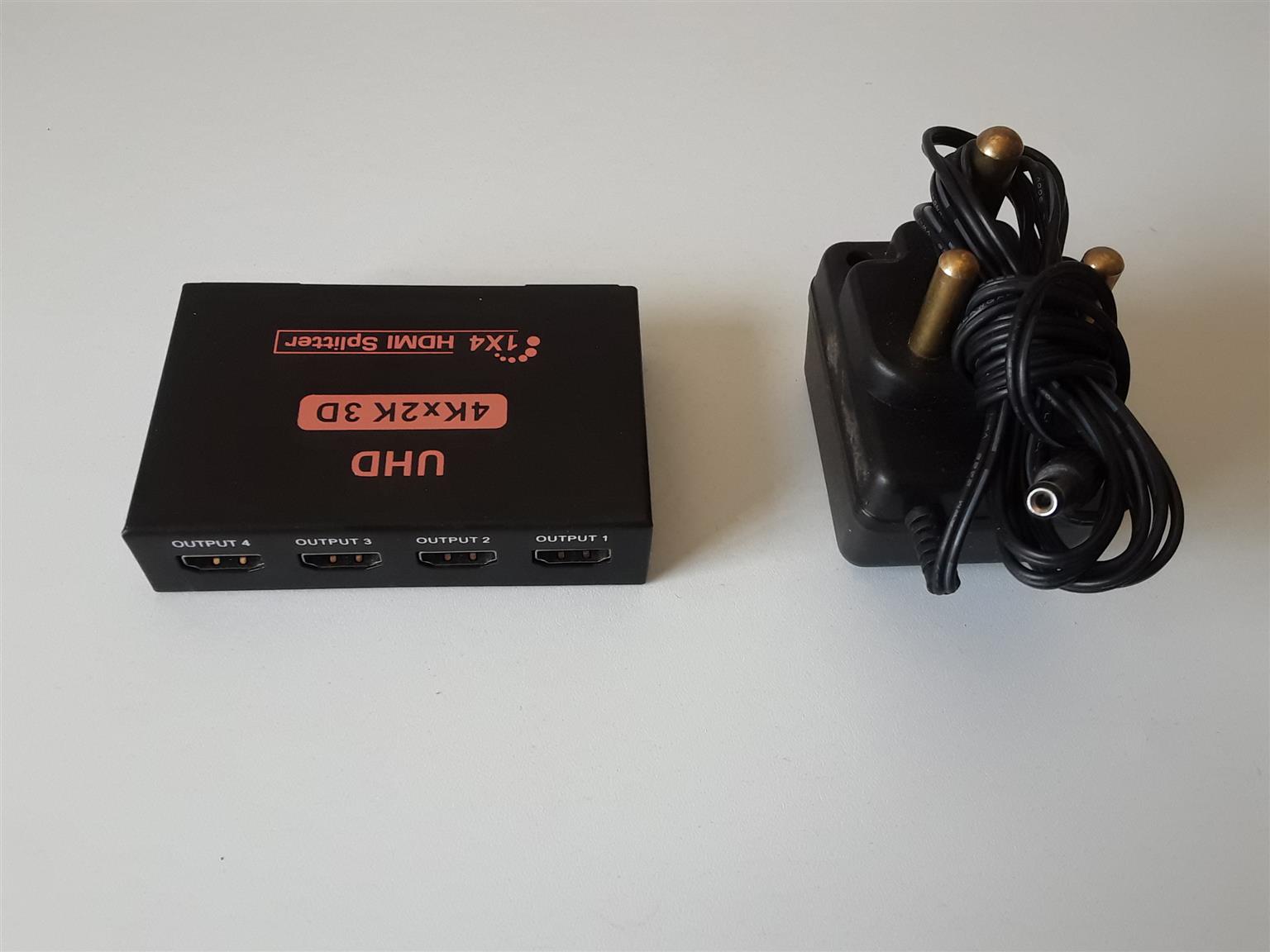 UHD 1 to 4 HDMI Splitter. Brand new in a Box. I am in Orange Grove.