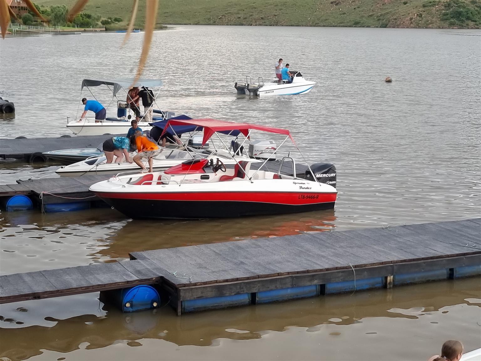 18 ft Exspression Funster boat with 150 Optimax Murcury Motor