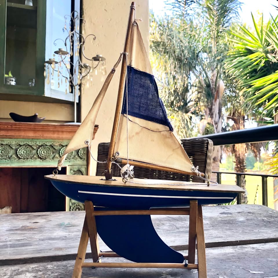 Vintage Decorative Sailing Boat on a wooden stand.