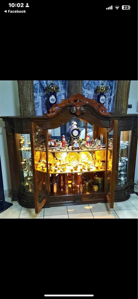 Display cabinet  Antique for both.It doesn’t come with ornaments  Whatsapp