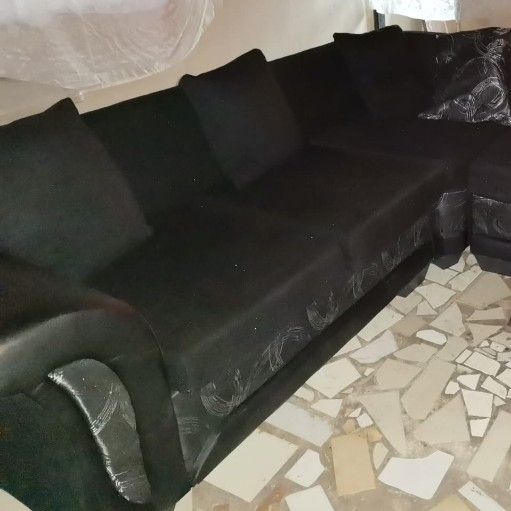 Black L-shape couches