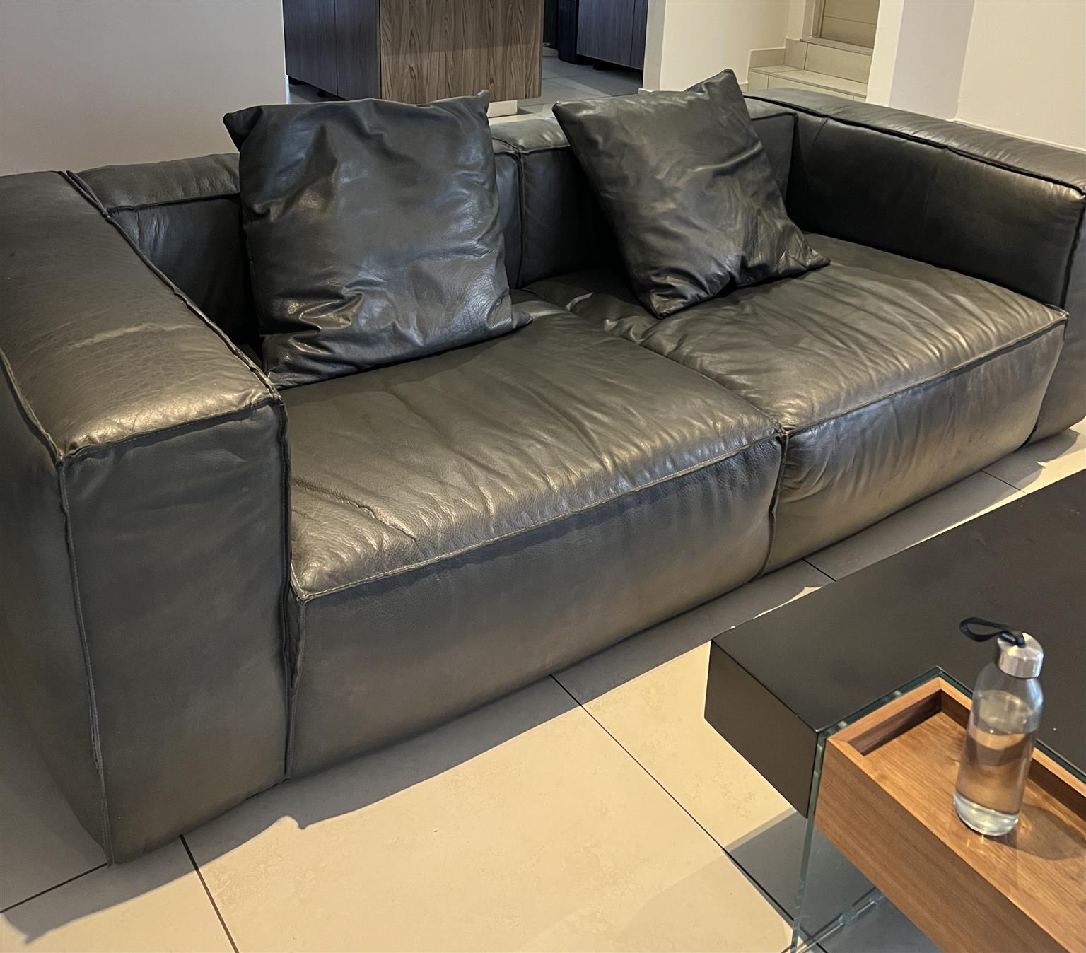 Weylandts Charcoal genuine leather 3 seater couch | Junk Mail