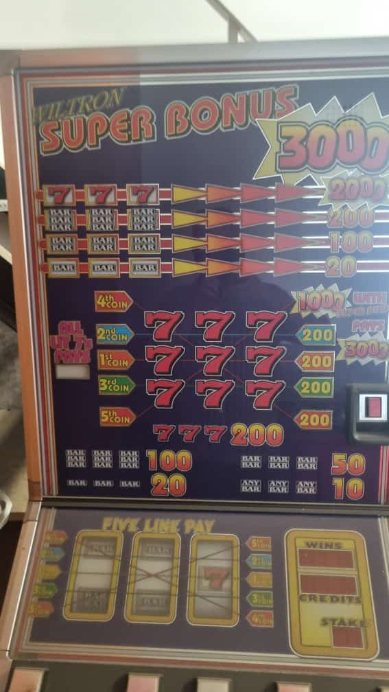 Unrestored Slot Machine -