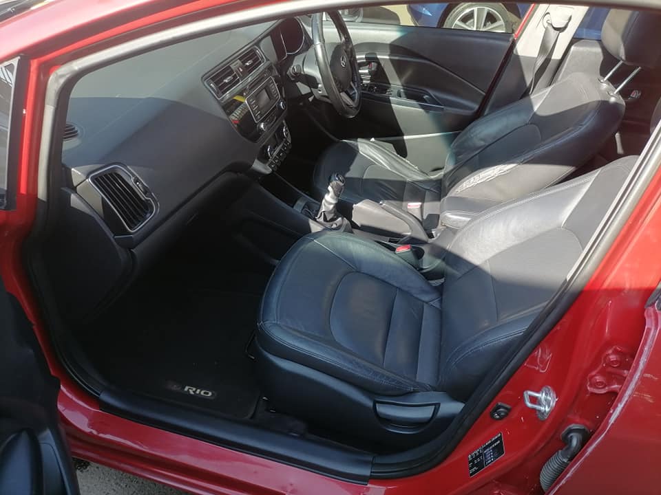 2015 Kia Rio 1.4 Tec Hatchback with a leather seat and sunroof Service book