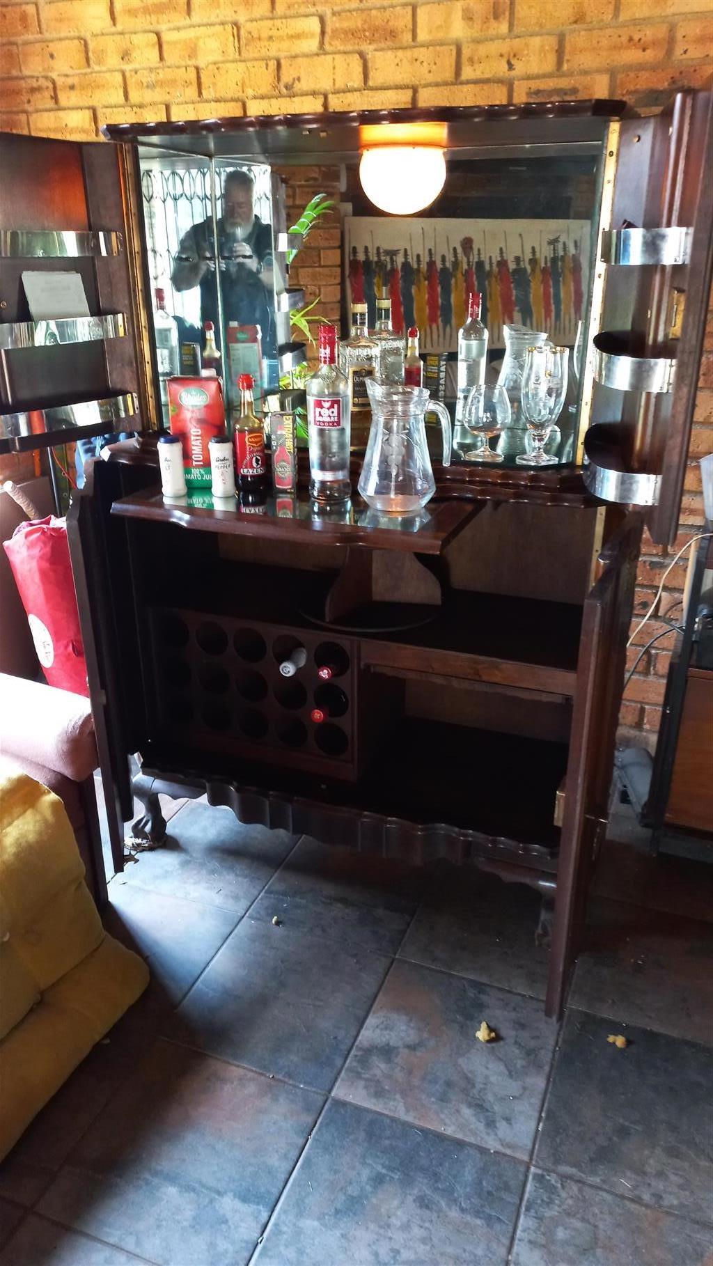 Imbuia ball and claw liquor cabinet