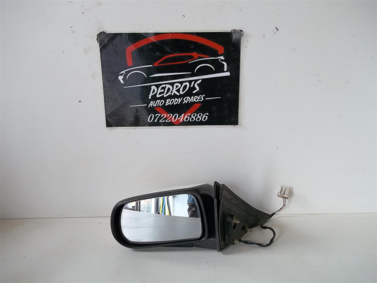 Used Mazda MX3 right mirror (Manual) for sale in Gauteng | Auto Mart