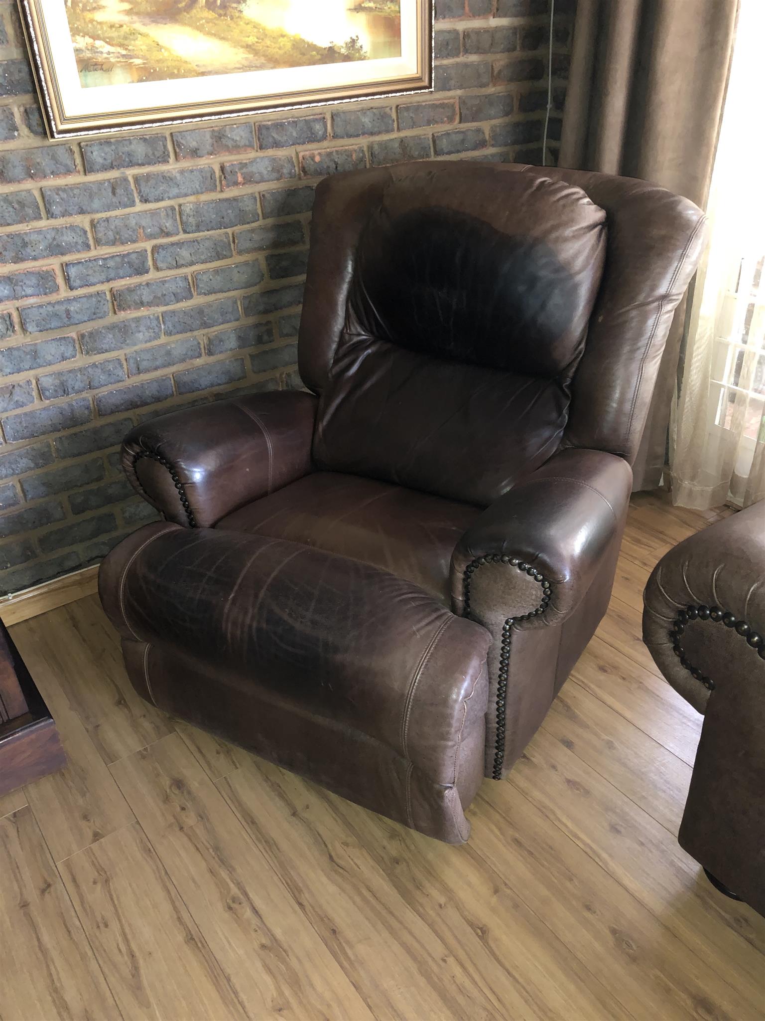 Geniune leather Coricraft recliner.  Junk Mail