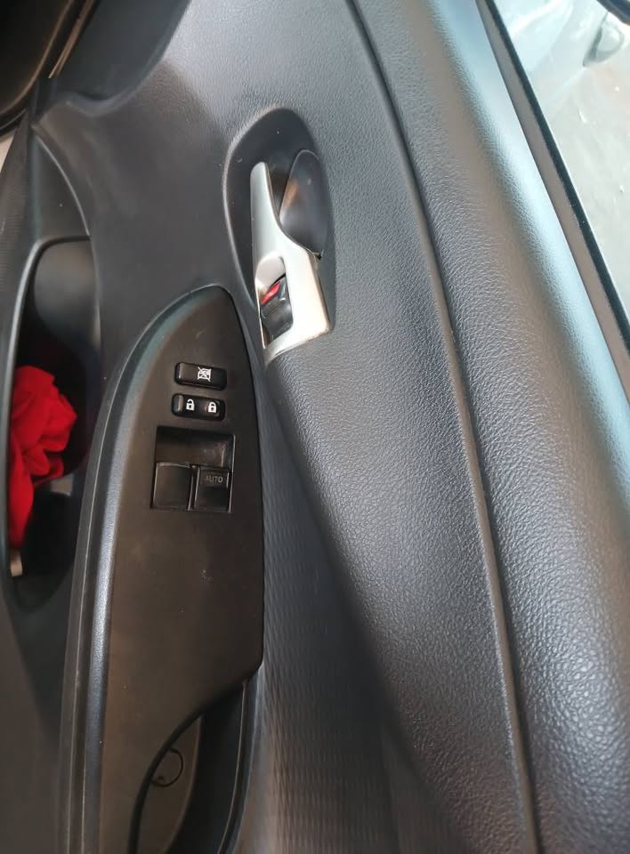 2014 model Toyota Corolla Quest sedan manual transmission petrol 1.6 engine capacity mileage