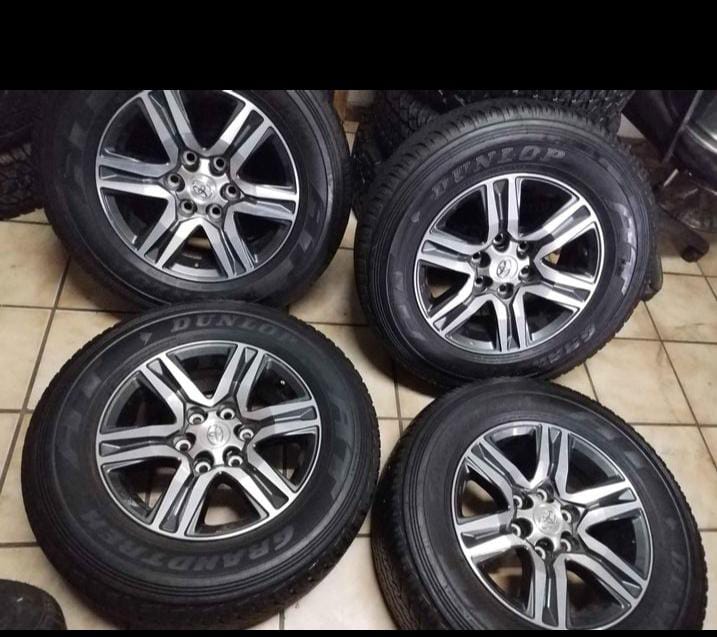 17inch Toyota Hilux/Fortuner original mags with faily new 265/65/17 Dunlop Grand - Private Seller 17inch Toyota Hilux/Fortuner original mags with faily new 265/65/17 Dunlop Grand - Private Seller