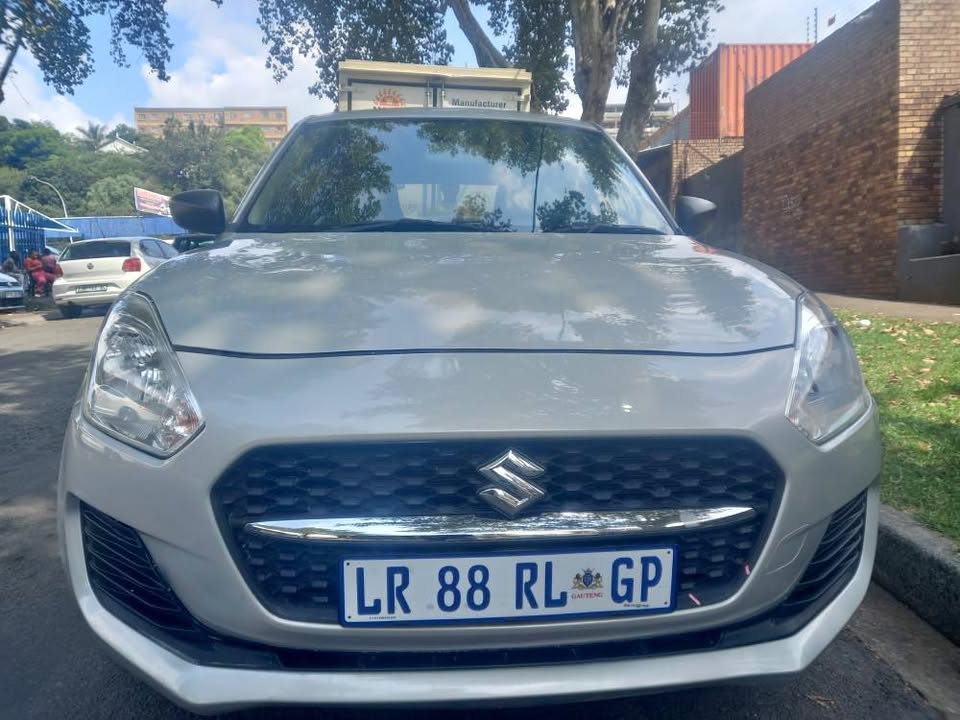 2024 SUZUKI SWIFT 1.2 MANUAL, SILVER, PETROL, 8000KMS,. Service book. 2024 SUZUKI SWIFT 1.2 MANUAL, SILVER, PETROL, 8000KMS,. Service book.