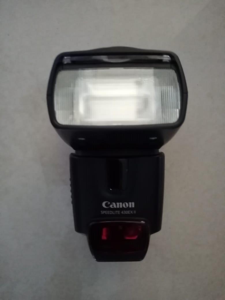 Canon Digital SLR Camera, Speedlite Flash and Manfrotto Tripod
