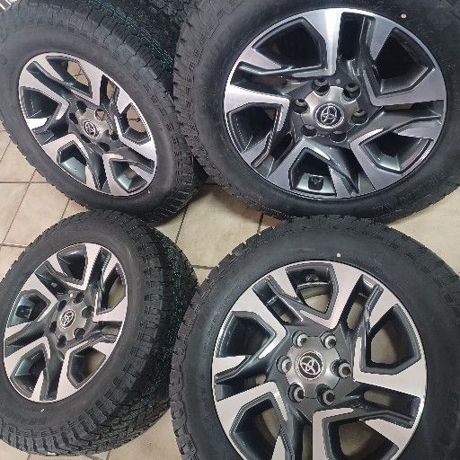 Toyota fortuna rims and general grabber at3