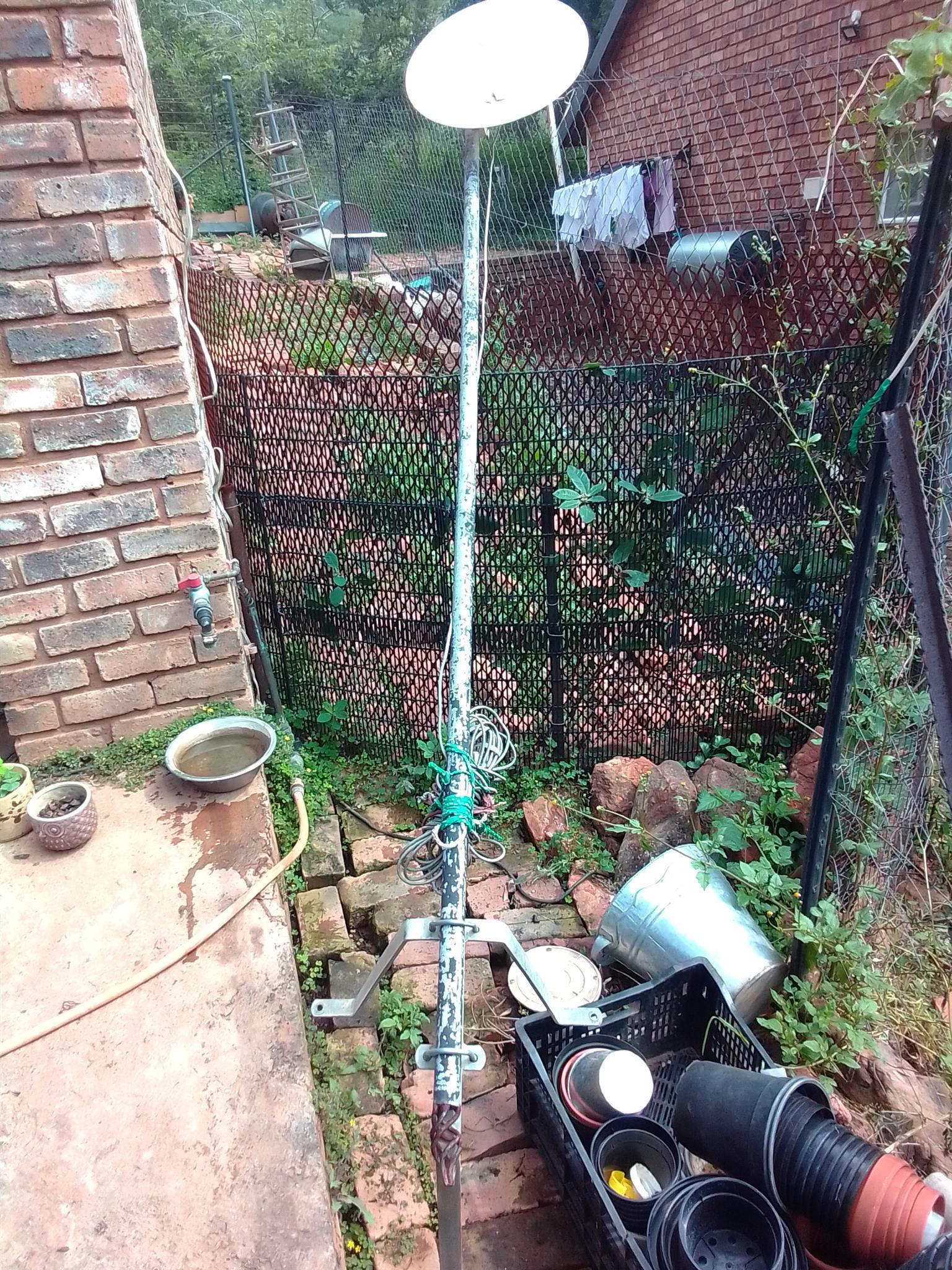 Dish with pole and wall bracket