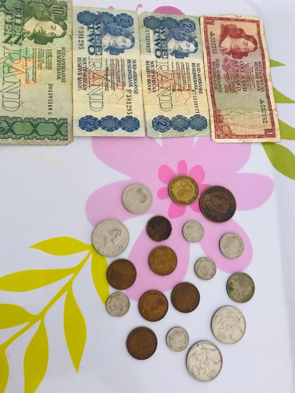 Four South African notes and 250 coins