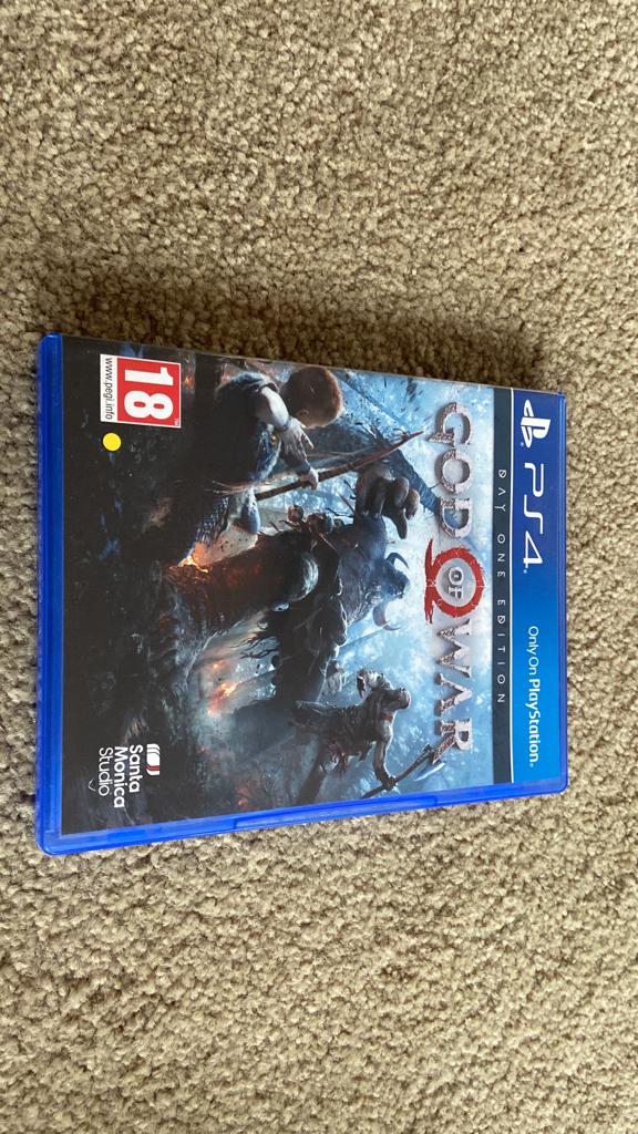 PlayStation 4 with 14 games and 1 remote