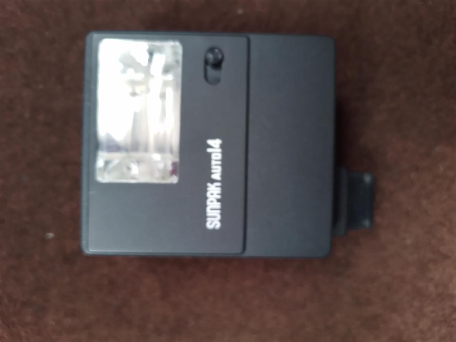 Sunpak Auto 14, Electronic Camera Flash Gun (light)