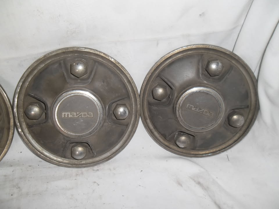 Mazda wheel cap set - Private Seller Mazda wheel cap set - Private Seller