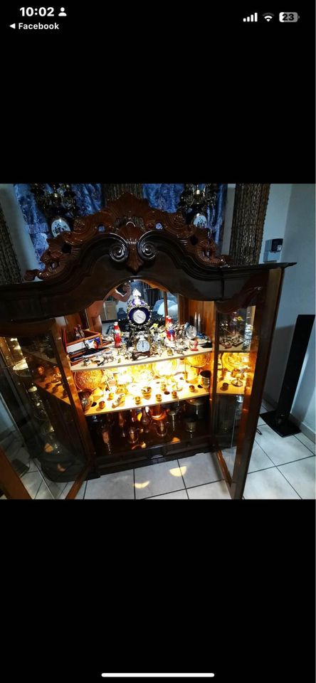 Display cabinet  Antique for both.It doesn’t come with ornaments  Whatsapp