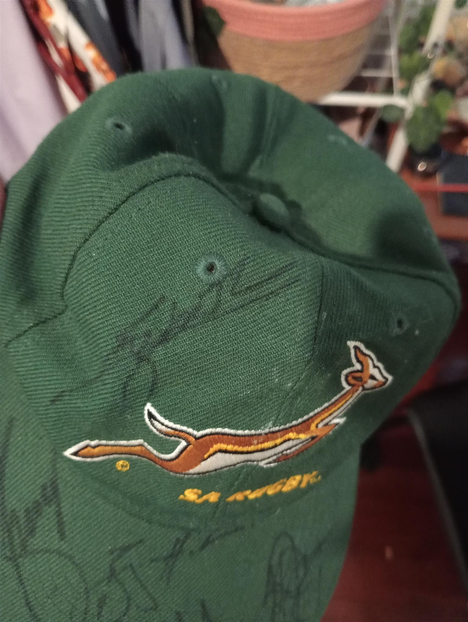 A cap signed by the springbok rugby team.