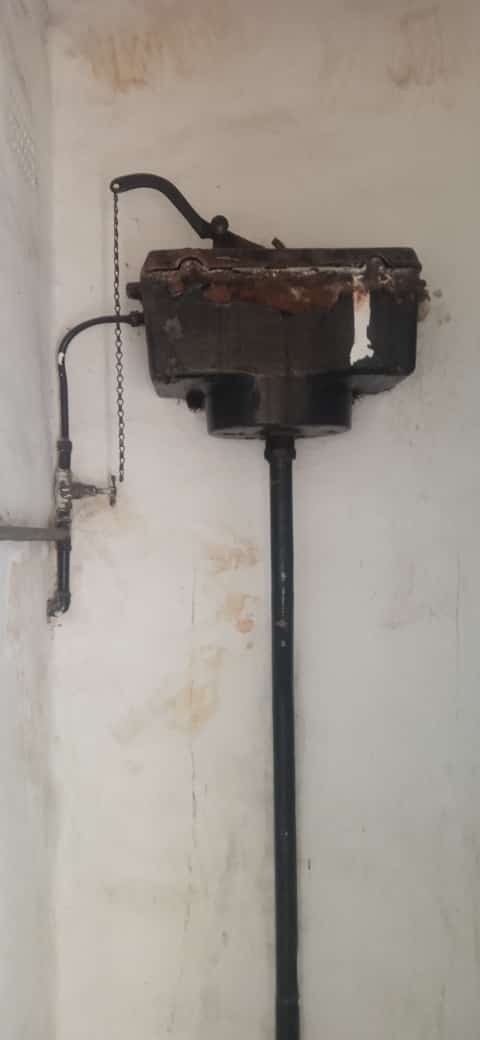 Vintage cast iron cistern