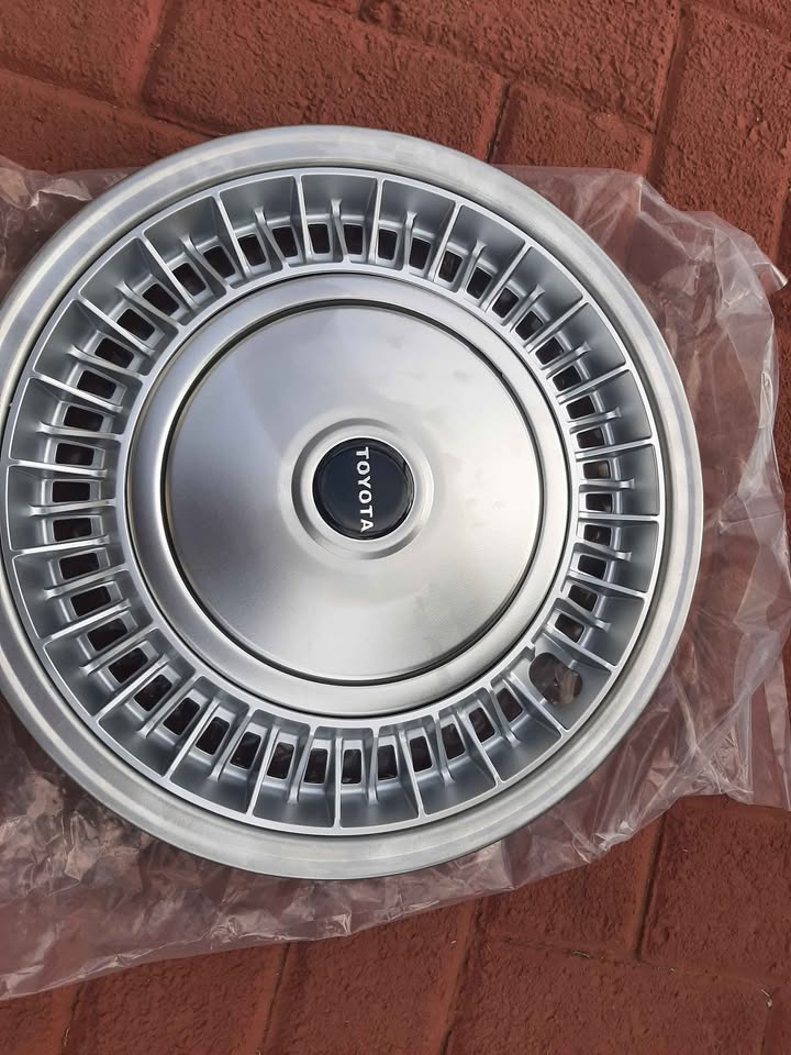 QUANTUM 14 INCH METAL WHEEL CAPS. BRAND NEW. FOR VARIOUS OTHER CARS TOO