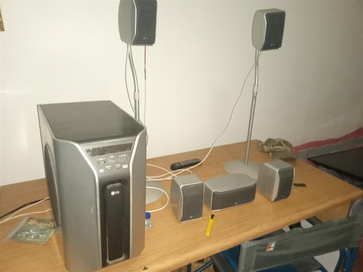 LG Dolby digital surround sound with 2 stands