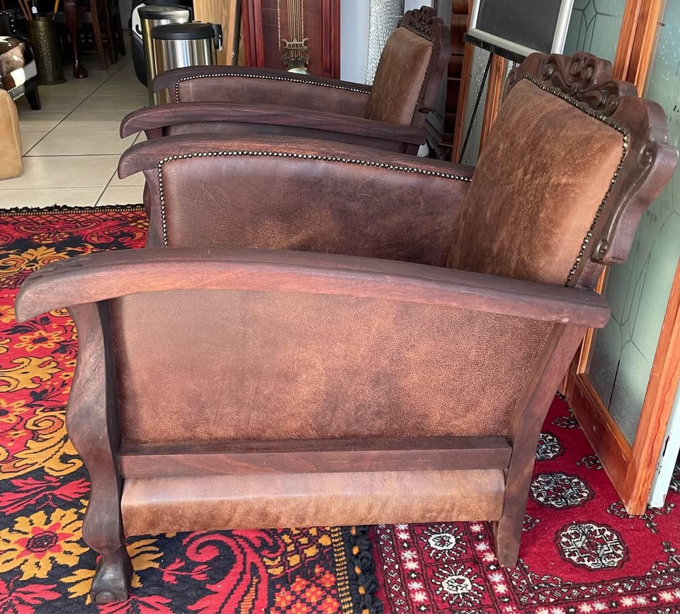 Antique Chairs - upholstered in brown buffalo leather ( price is per chair)