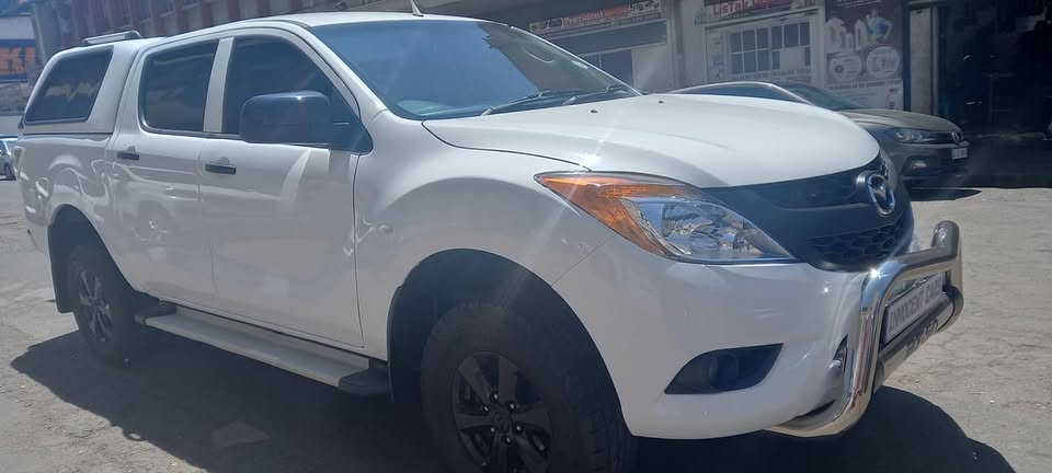 2014 MAZDA BT 50 2.5 PETROL, MANUAL TRANSMISSION, WHITE COLOUR, MILEAGE