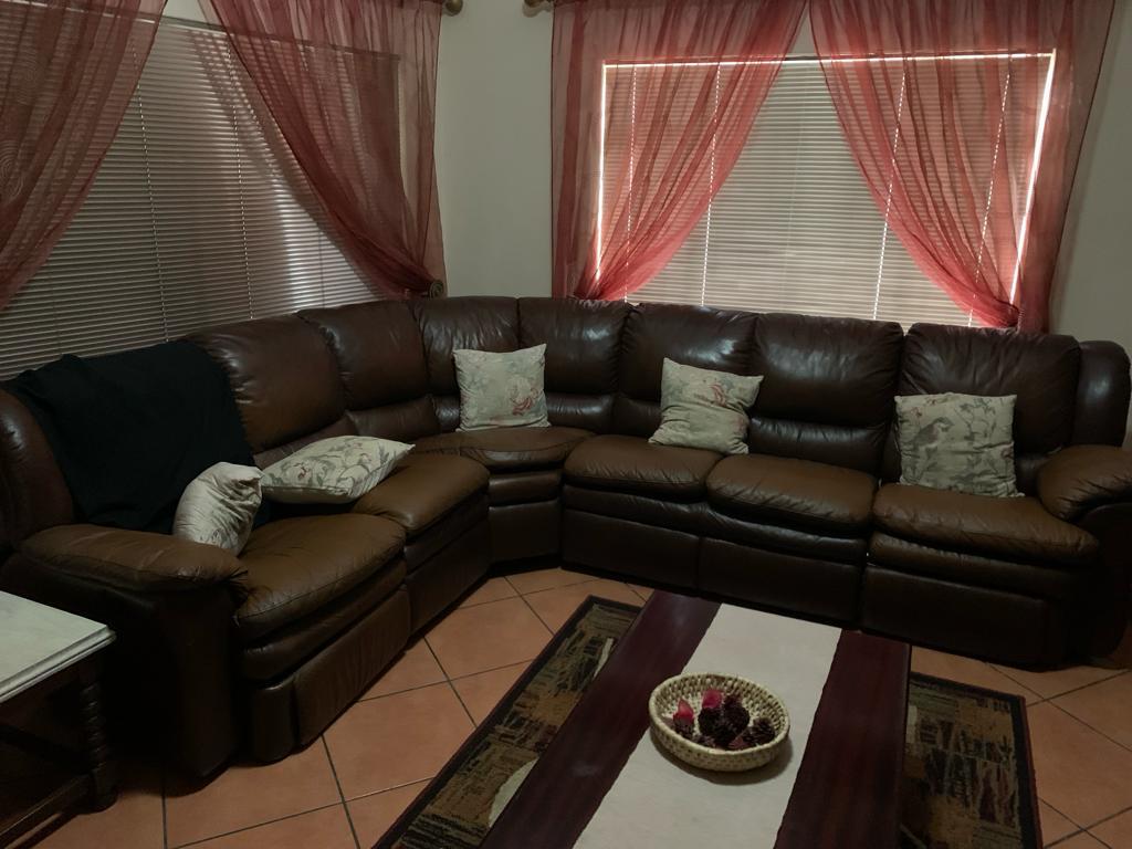 CanopyLeather Lshape couches Ball & Claw set8Seater table & chairs