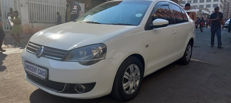 2015 POLO VIVO CONCEPTLINE 1.4 AUTOMATIC, WHITE COLOUR, 87000KM