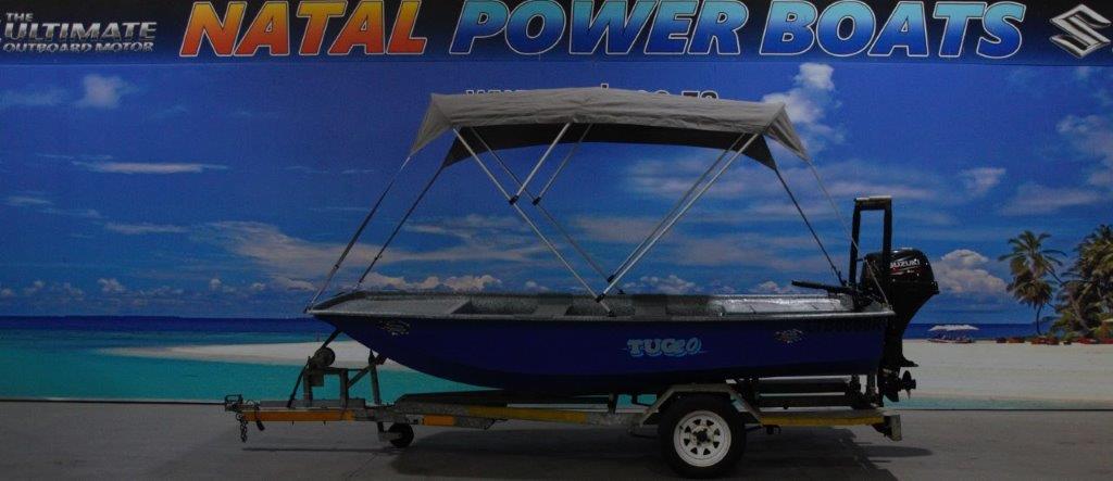 TUG 20 ON TRAILER 15 HP SUZUKI 4 STROKE TILLER TUG 20 ON TRAILER 15 HP SUZUKI 4 STROKE TILLER